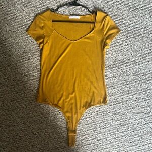 Elodie yellow bodysuit size L